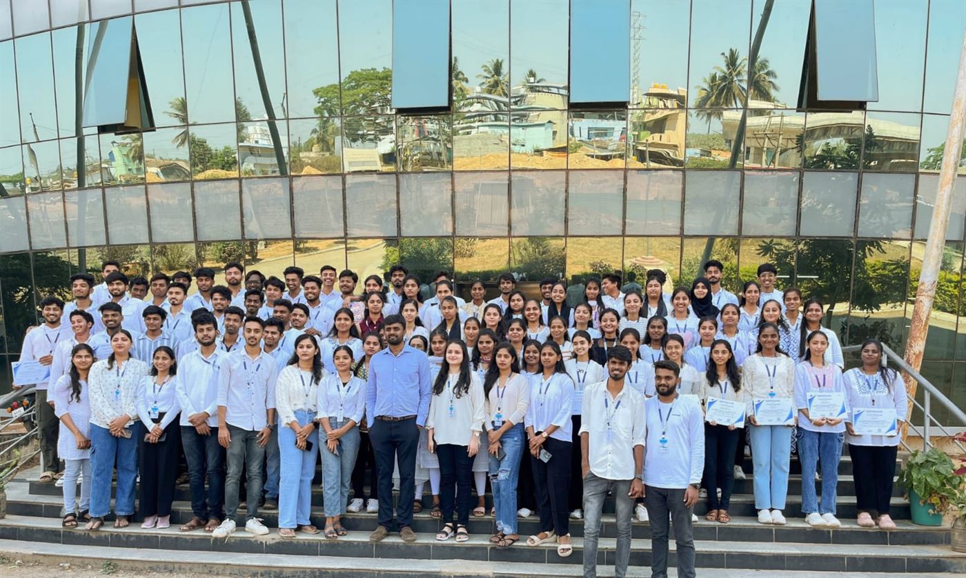 An intern batch outside the office