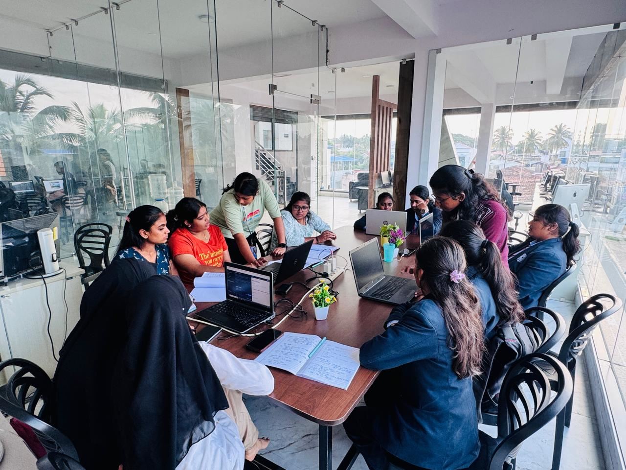 Interns discussing a project