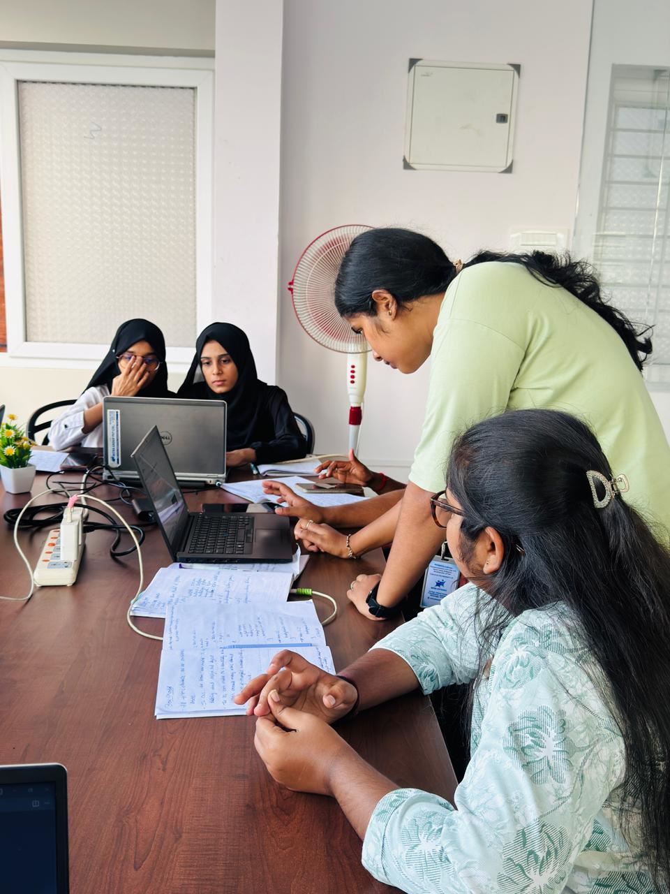 A Mitra Softwares mentor helping students
